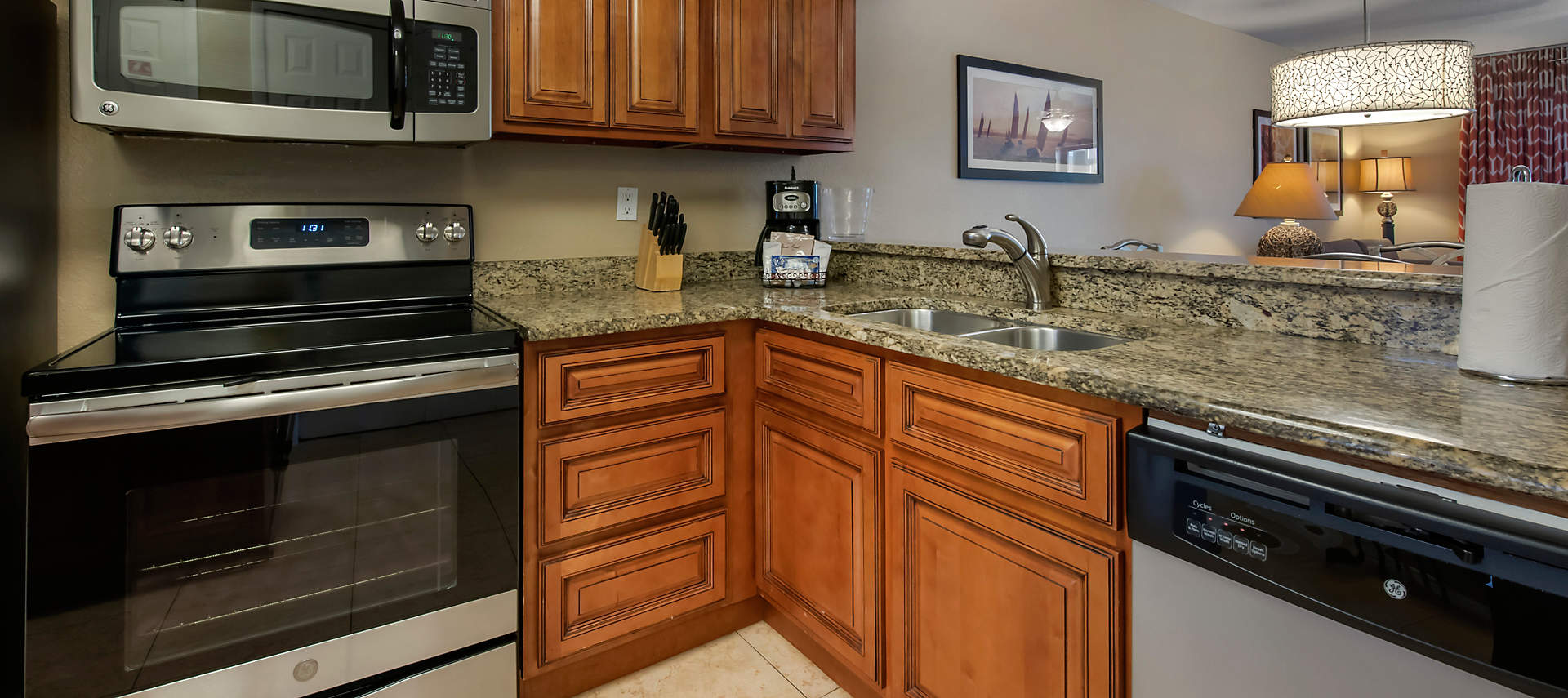 03-sales-kiosk-OSR-orlandos-sunshine-resort1-2-bed-kitchen
