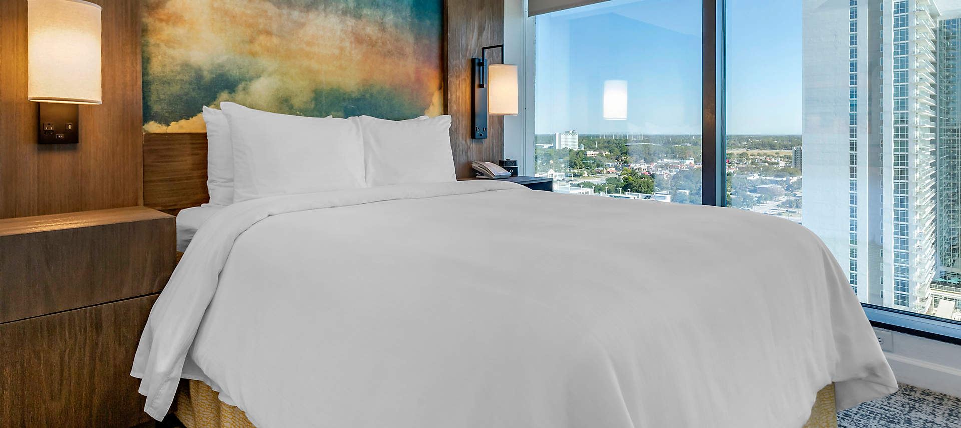 kiosk-SGT-seaglass-tower-1bed-deluxe-oceanfront-guestroom1