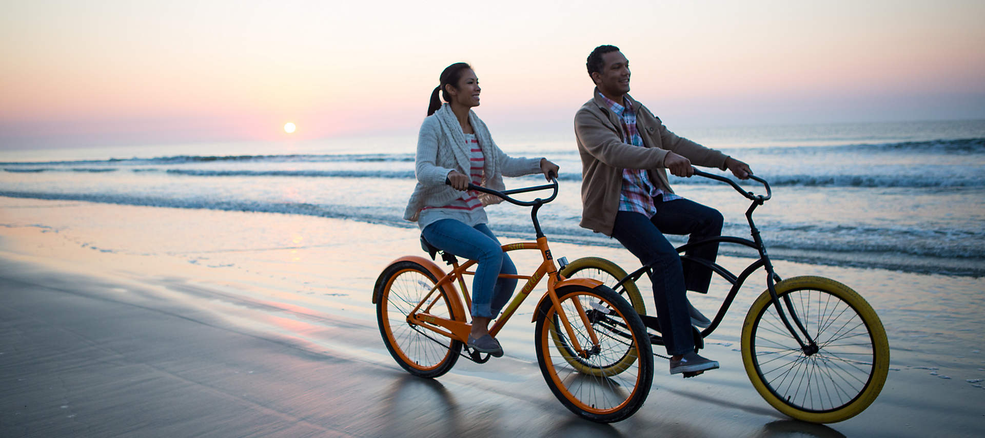 kiosk-myrtle-beach-south-carolina-couple-bikes-beach-sunset-1